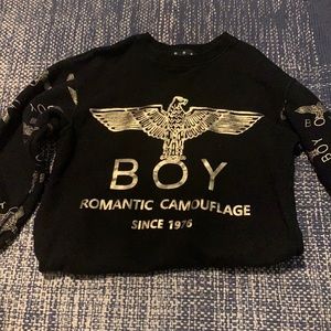 gold and black long sleeve shirt